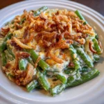 Baked casserole with green beans, cheese, and golden onion topping