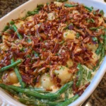 Sliced potatoes and green beans baked in a creamy sauce